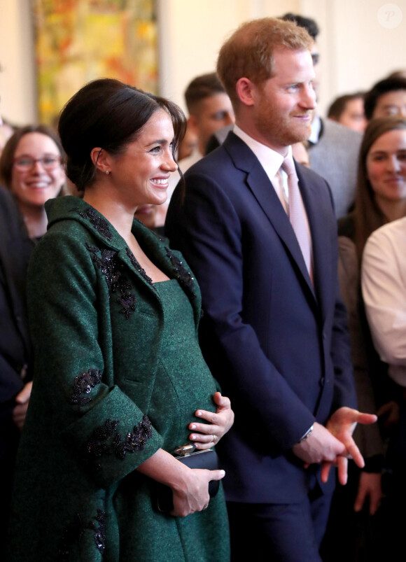 Le prince Harry, duc de Sussex, Meghan Markle, enceinte, duchesse de Sussex, lors de leur visite à Canada House dans le cadre d'une cérémonie pour la Journée du Commonwealth à Londres le 11 mars 2019.