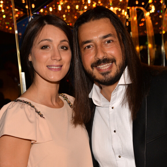 Moundir et sa femme Inès - Personnalités lors de la 10ème cérémonie des Globes de Cristal au Lido à Paris.