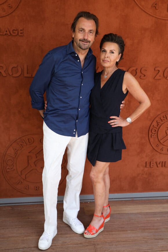 Henri Leconte et sa compagne Maria Dowlatshahi au village des Internationaux de France de Roland Garros à Paris le 9 juin 2021. © Dominique Jacovides / Bestimage