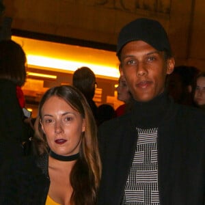 Le chanteur Stromae et sa femme Coralie Barbier - Défilé de mode "Kenzo" collection prêt-à-porter Printemps-Eté 2017 lors de la Fashion Week de Paris à la Cité de l'architecture et du patrimoine au Trocadéro à Paris, France, le 4 octobre 2016. © Agence/Bestimage 