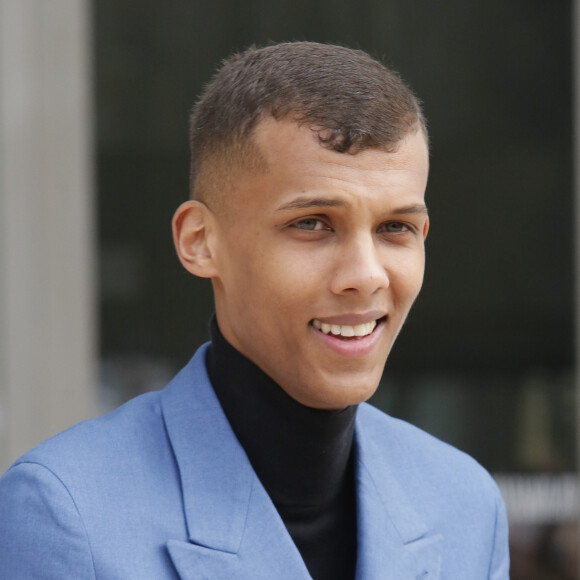 Stromae - People à la sortie du défilé de mode "Louis Vuitton", collection prêt-à-porter automne-hiver 2015/2016, à Paris. Le 11 mars 2015