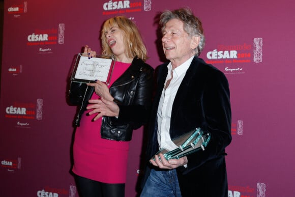 Emmanuelle Seigner (Meilleure Actrice) et son mari Roman Polanski (Meilleur Réalisateur) lors du déjeuner des nommés aux César au restaurant Fouquet's à Paris, le 8 février 2014.