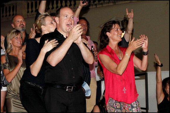 Le prince Albert de Monaco et Charlene Wittstock au concert de Iggy Pop à Monaco en 2010.
