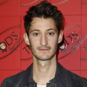 Pierre Niney au photocall de la soirée Tod's x Alber Elbaz "Happy Moment" au Palais de Tokyo à Paris, France.