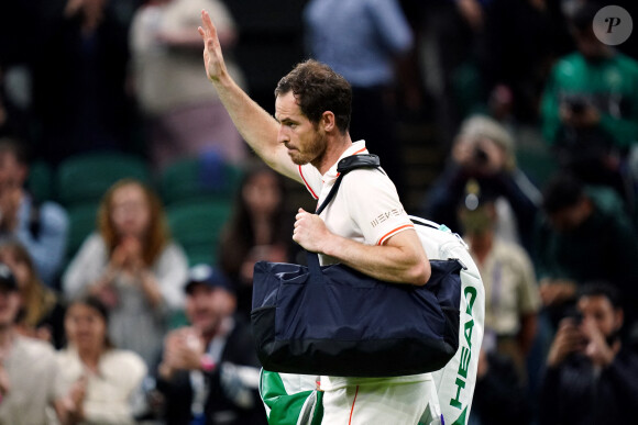 Andy Murray acknowledges the crowd as he walks off court after beating Nikoloz Basilashvili on Centre Court on day one of Wimbledon at The All England Lawn Tennis and Croquet Club, Wimbledon. Picture date: Monday June 28, 2021. ... Wimbledon 2021 - Day One - The All England Lawn Tennis and Croquet Club ... 28-06-2021 ... London ... UK ... Photo credit should read: John Walton/PA Wire. Unique Reference No. 60635729 ... See PA story TENNIS Wimbledon. Photo credit should read: John Walton/PA Wire. RESTRICTIONS: Editorial use only. No commercial use without prior written consent of the AELTC. Still image use only - no moving images to emulate broadcast. No superimposing or removal of sponsor/ad logos. 