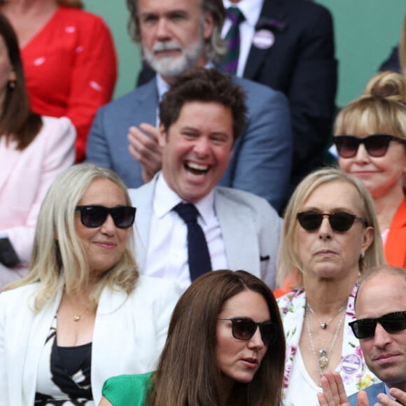 Kate Middleton, duchesse de Cambridge, et son mari le prince William, duc de Cambridge, assistent à la finale simple dames de Wimbledon opposant l'Australienne Ashleigh Barty à la Tchèque Karolína Plíšková. Londres, le 10 juillet 2021.