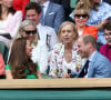 Kate Middleton, duchesse de Cambridge, et son mari le prince William, duc de Cambridge, assistent à la finale simple dames de Wimbledon opposant l'Australienne Ashleigh Barty à la Tchèque Karolína Plíšková. Londres, le 10 juillet 2021.