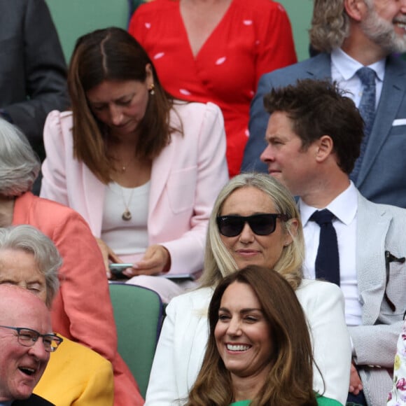 Kate Middleton, duchesse de Cambridge, et son mari le prince William, duc de Cambridge, assistent à la finale simple dames de Wimbledon opposant l'Australienne Ashleigh Barty à la Tchèque Karolína Plíšková. Londres, le 10 juillet 2021.