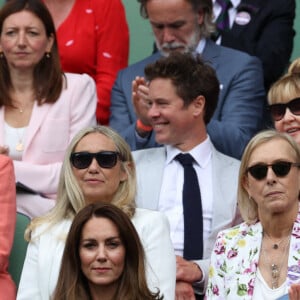 Kate Middleton, duchesse de Cambridge, et son mari le prince William, duc de Cambridge, assistent à la finale simple dames de Wimbledon opposant l'Australienne Ashleigh Barty à la Tchèque Karolína Plíšková. Londres, le 10 juillet 2021.