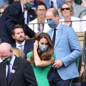 Kate Middleton, duchesse de Cambridge, et son mari le prince William, duc de Cambridge, assistent à la finale simple dames de Wimbledon opposant l'Australienne Ashleigh Barty à la Tchèque Karolína Plíšková. Londres, le 10 juillet 2021.