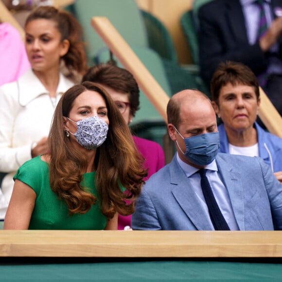 Kate Middleton, duchesse de Cambridge, et son mari le prince William, duc de Cambridge, assistent à la finale simple dames de Wimbledon opposant l'Australienne Ashleigh Barty à la Tchèque Karolína Plíšková. Londres, le 10 juillet 2021.