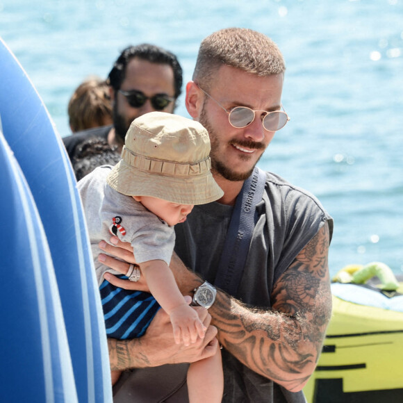 Exclusif - M. Pokora profite de la plage du Martinez et de la navette du palace, avec sa compagne Christina Milian et leur fille Isaiah, pour fuir la foule et se réfugier sur les îles au large de Cannes, le 22 juillet 2020.