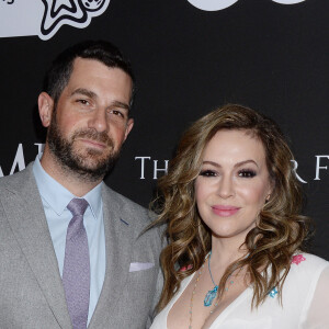 Alyssa Milano et son mari Dave Bugliari au photocall du 10ème anniversaire du gala caritatif "Core" à Los Angeles, le 15 janvier 2020. 