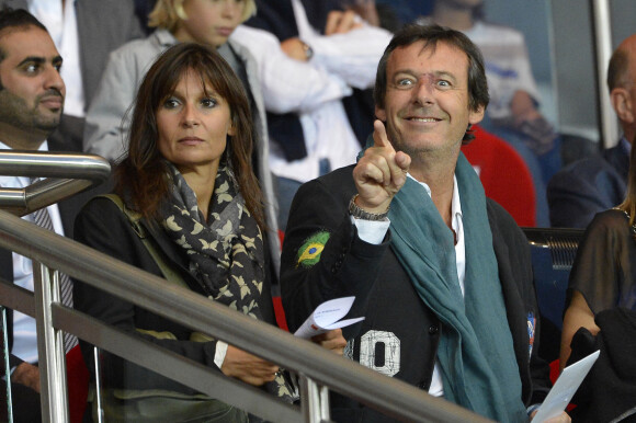 Jean-Luc Reichmann et sa femme Nathalie au match PSG-Bordeaux au Parc des Princes, à Paris le 26 août 2012.