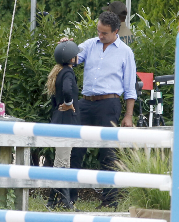 Exclusif - Olivier Sarkozy encourage sa femme Mary-Kate Olsen lors du jumping "Hampton Classic Horse Show " à Bridgehampton près de New York le 1er septembre 2016.