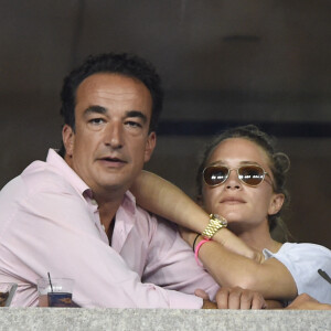 Olivier Sarkozy et Mary-Kate Olsen lors du tournoi de l'US Open à Flushing.
