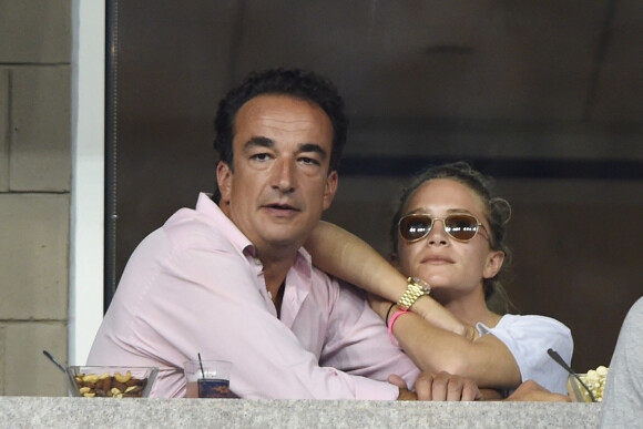 Olivier Sarkozy et Mary-Kate Olsen lors du tournoi de l'US Open à Flushing.