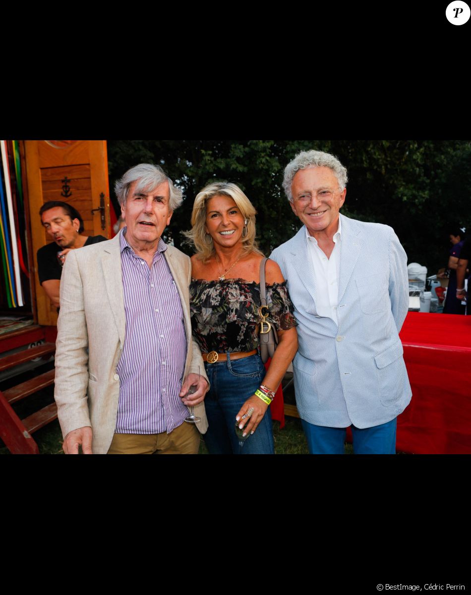 Bernard Ménez, Caroline Margeridon et Nelson Monfort à l'inauguration de la "Fête à Neuneu" au profit de l'association "Innocence En Danger" sur la pelouse de la Muette au Bois de Boulogne, à Paris, France, le 3 septembre 2021. © Cédric Perrin/Bestimage
