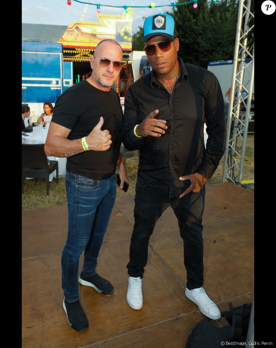 Pascal Soetens et Lord Kossity à l'inauguration de la "Fête à Neuneu" au profit de l'association "Innocence En Danger" sur la pelouse de la Muette au Bois de Boulogne, à Paris, France, le 3 septembre 2021. © Cédric Perrin/Bestimage
