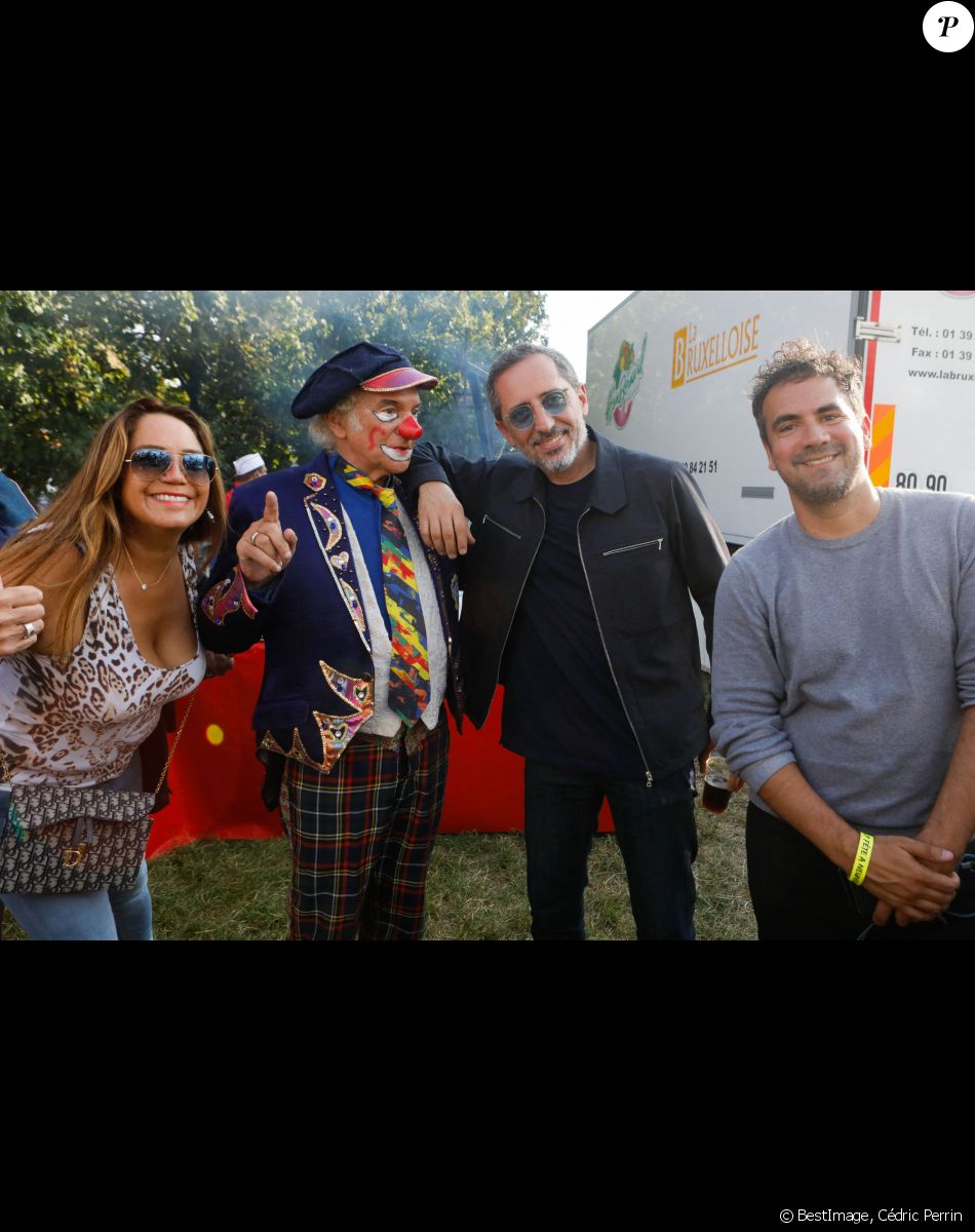 Singrid Campion (fille de Marcel Campion), Gad Elmaleh et Alex Goude à l'inauguration de la "Fête à Neuneu" au profit de l'association "Innocence En Danger" sur la pelouse de la Muette au Bois de Boulogne, à Paris, France, le 3 septembre 2021. © Cédric Perrin/Bestimage