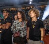 Yannick Noah avec ses deux enfants Joalukas et Eleejah, à Roland-Garros le 10 septembre 2021.