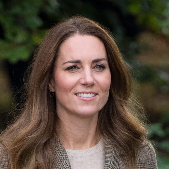 Catherine (Kate) Middleton, duchesse de Cambridge, lors d'une excursion en bateau à vapeur avec deux des "enfants de Windermere", qui ont été amenés à vivre en Cumbrie après les horreurs du camp de concentration de Theresienstadt en Tchécoslovaquie en 1945, à Cumbrie, Royaume Uni, le 21 septembre 2021.