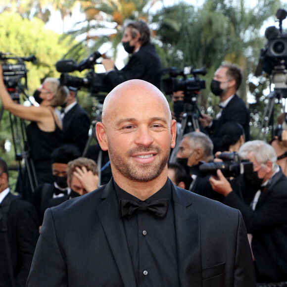 Franck Gastambide - Montée des marches du film "OSS 117 : Alerte rouge en Afrique Noire" lors du 74e Festival de Cannes. Le 17 juillet 2021. © Borde-Jacovides-Moreau / Bestimage