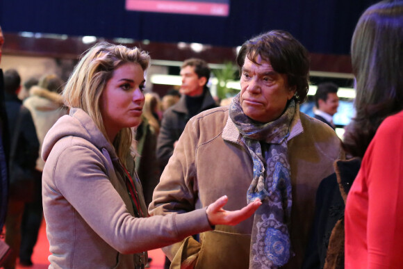 Bernard Tapie avec sa fille sophie - Dans le cadre du Gucci Paris Masters a eu lieu l'epreuve "Style & Competition for AMADE" a Villepinte le 7 décembre 2013.