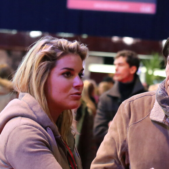 Bernard Tapie avec sa fille sophie - Dans le cadre du Gucci Paris Masters a eu lieu l'epreuve "Style & Competition for AMADE" a Villepinte le 7 décembre 2013.