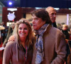 Bernard Tapie et sa fille Sophie - Dans le cadre du Gucci Paris Masters a eu lieu l'epreuve "Style & Competition for AMADE" a Villepinte le 7 décembre 2013.