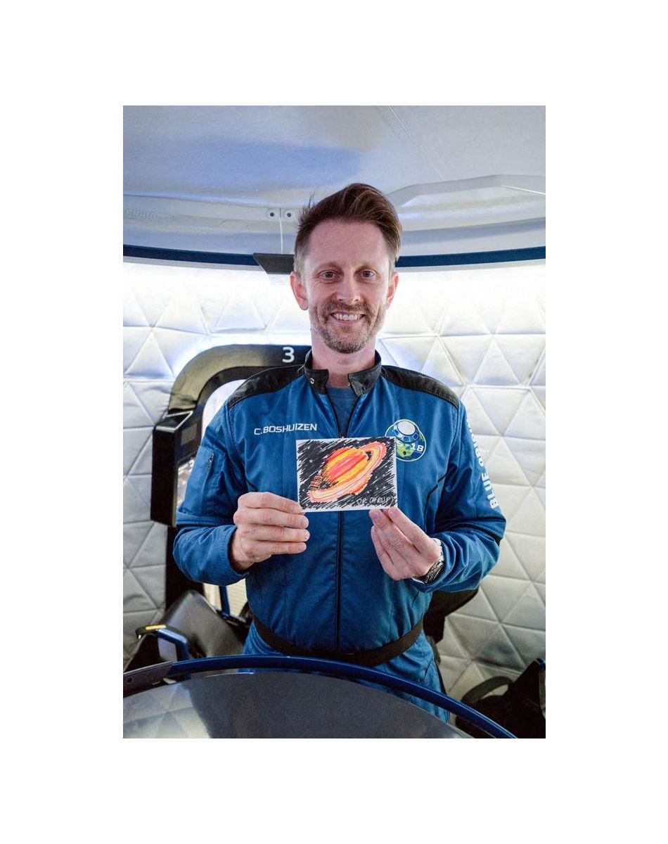 Chris Boshuizen embarque à bord de la fusée Blue Origin pour un vol suborbital depuis le Texas, le 13 octobre 2021.