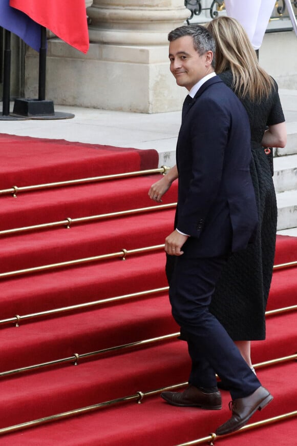 Le ministre de l'Intérieur, Gérald Darmanin et son épouse Rose-Marie Devillers arrivent pour un dîner d'Etat avec le président français et italien, au palais de l'Elysée, Paris, le 5 juillet 2021.