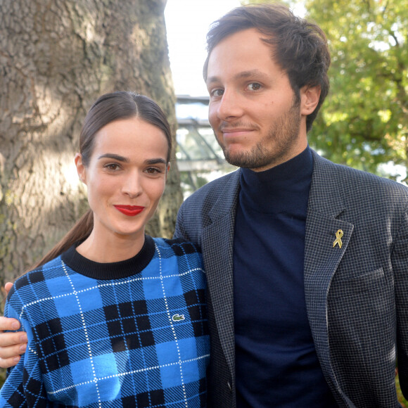 Vianney Bureau (Vianney), sa compagne Catherine Robert - People au défilé Lacoste Collection Prêt-à-Porter Printemps/Eté lors de la Fashion Week de Paris. © Veeren Ramsamy-Christophe Clovis/Bestimage 