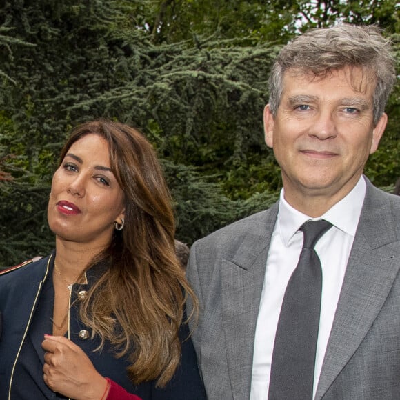 Arnaud Montebourg et Amina Walter en backstage lors de l'évènement "Le Concert de Paris" depuis le Champ-de-Mars à l'occasion de la Fête Nationale du 14 Juillet 2021.