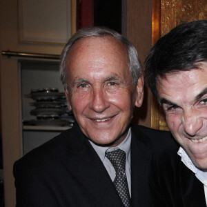 Patrice Laffont et Tex lors du dîner caritatif au profit de l'association "Soleil d'Enfance" au Fouquet's à Paris, le 29 novembre 2011.