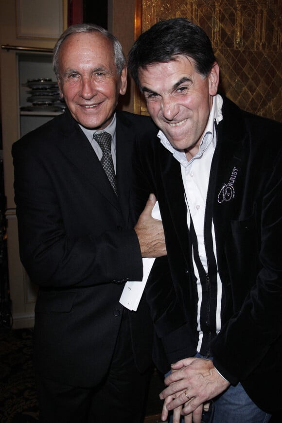 Patrice Laffont et Tex lors du dîner caritatif au profit de l'association "Soleil d'Enfance" au Fouquet's à Paris, le 29 novembre 2011.