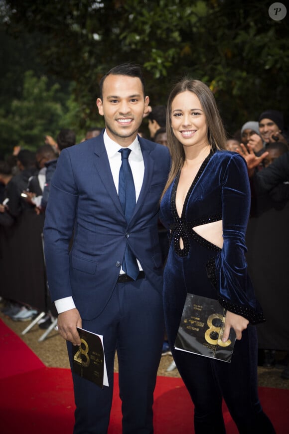 Mohamed Bouhafsi et sa compagne arrivent à la 28ème cérémonie des trophées UNFP (Union nationale des footballeurs professionnels) au Pavillon d'Armenonville à Paris, France, le 19 mai 2019. 