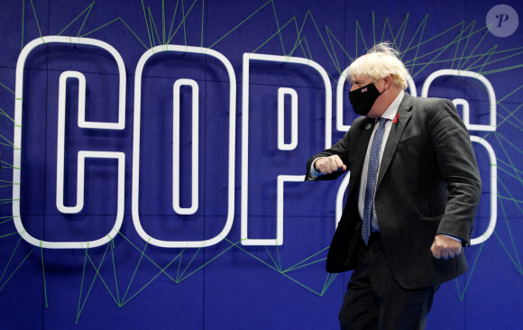Le Premier ministre britannique Boris Johnson arrive au sommet de la COP26 au Scottish Event Campus (SEC) à Glasgow, Royaume Uni, le 10 novembre 2021.