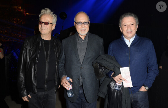 Luc Plamondon, René Angélil et Michel Drucker au concert de Céline Dion au POPB de Paris, le 5 décembre 2013. 