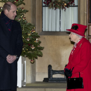 Catherine Kate Middleton, duchesse de Cambridge, le prince William, duc de Cambridge, la reine Elisabeth II d'Angleterre - La famille royale se réunit devant le chateau de Windsor pour remercier les membres de l'Armée du Salut et tous les bénévoles qui apportent leur soutien pendant l'épidémie de coronavirus (COVID-19) et à Noël le 8 décembre 2020. 