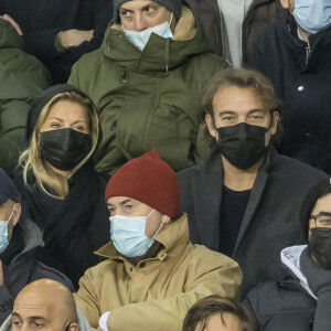 Patrick Puydebat et sa compagne Magali en tribune lors du match de ligue des champions (Champions League) PSG (Paris Saint Germain) conte Bruges 4-1 au Parc des Princes à Paris.