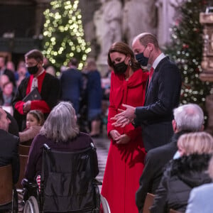 Le prince William, duc de Cambridge, et Catherine (Kate) Middleton, duchesse de Cambridge, assistent au service de chant communautaire Together At Christmas à l'abbaye de Westminster, à Londrtes, Royaume Uni, le 8 décembre 2021.