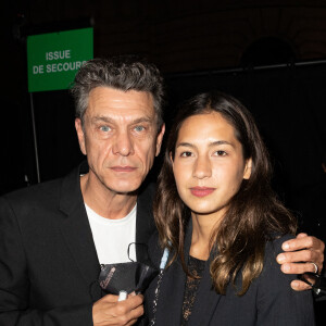 Marc Lavoine et Line Papin - Défilé Etam Live Show 2020 à Paris, le 30 septembre 2020. © Pool Agence Bestimage