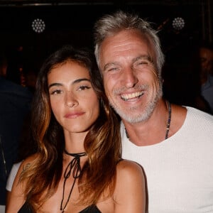 Exclusif - David Ginola et sa nouvelle et jeune compagne Maeva Denat - Soirée de la Summer Party des 50 ans du Byblos et des Caves du Roy à Saint-Tropez. © Rachid Bellak/Bestimage