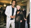 Yannick Noah et sa compagne Isabelle Camus (enceinte de leur fils Joalukas), à Paris en 2004.