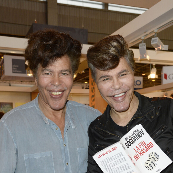 Igor et Grichka Bogdanoff - 34ème édition du salon du livre à la Porte de Versailles à Paris le 23 mars 2014.
