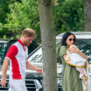 Le prince Harry, duc de Sussex, Meghan Markle, duchesse de Sussex et leur fils Archie Harrison Mountbatten-Windsor lors d'un match de polo de bienfaisance King Power Royal Charity Polo Day à Wokinghan, comté de Berkshire, Royaume Uni, le 10 juillet 2019.