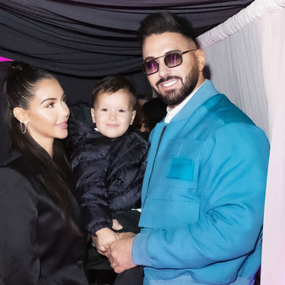 Exclusif - Nabilla Benattia, son mari Thomas Vergara et leur fils Milann - Nabilla Benattia, son mari Thomas Vergara et leur fils Milann posent lors de l'avant première du documentaire "Nabilla sans filtre" (Amazon Prime Vidéo) à Paris le 22 Novembre 2021.© Jack Tribeca / Bestimage 