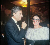 Nino Cerruti et Emmanuelle Khanh à Paris en 1988.