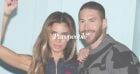Sergio Ramos et sa femme Pilar, lookée en jean, font le show au défilé Louis Vuitton